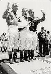 The late Johnny Longden (center) is flanked by Eddie Arcaro (left) and Bill Shoemaker at Hollywood Park in 1979.Photo from espn.go.com