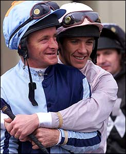 Eddery, known as 'God' in the weighing room, gets a hug from fellow jockey Frankie Dettori. Photo from BBCSport